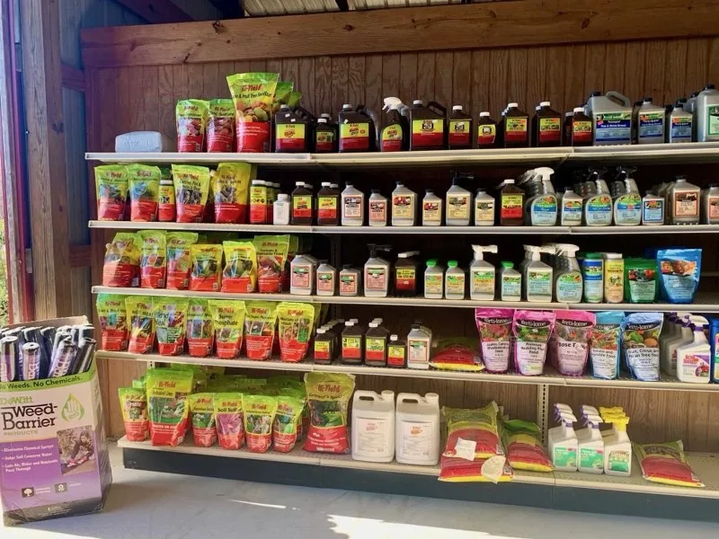Shelves of packaged garden products inside The Garden Center